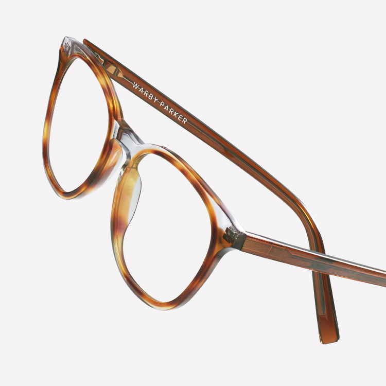The Carlton frame in Nimbus Crystal with Cacao and Oak Barrel