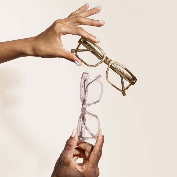 Hands holding glasses