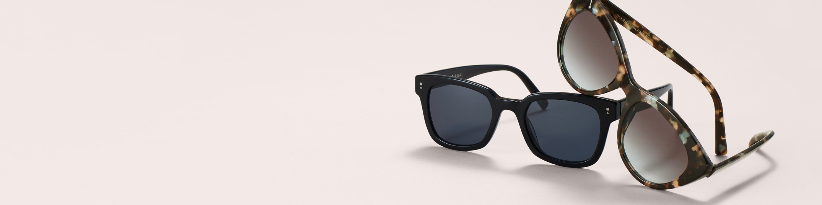 Two sunglasses in classic square and round shapes