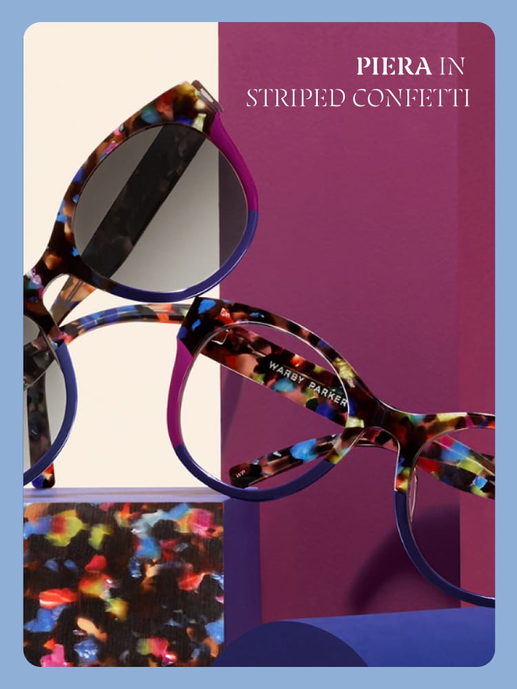 Colorful "Piera in Striped Confetti" glasses with bold multicolor frames on a modern backdrop.