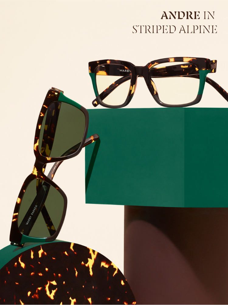 Bold "Andre in Striped Alpine" glasses featuring tortoiseshell and green frames on a sleek geometric backdrop.