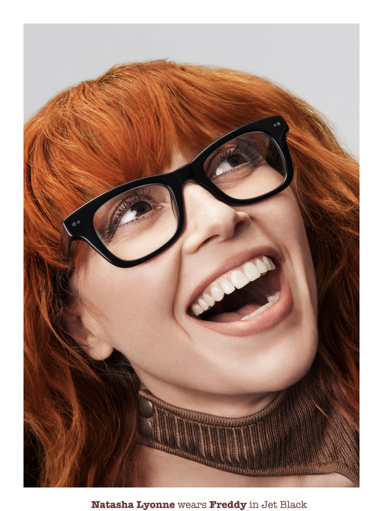 Woman smiling looking up.
