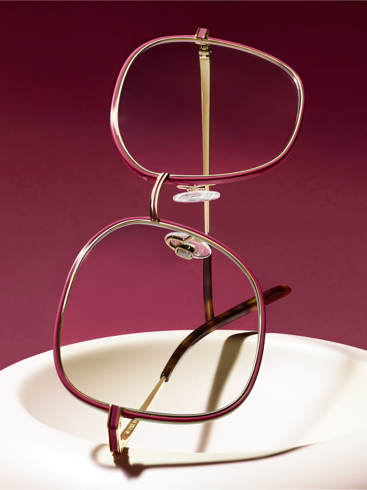 Frames on a white plate in a red background.