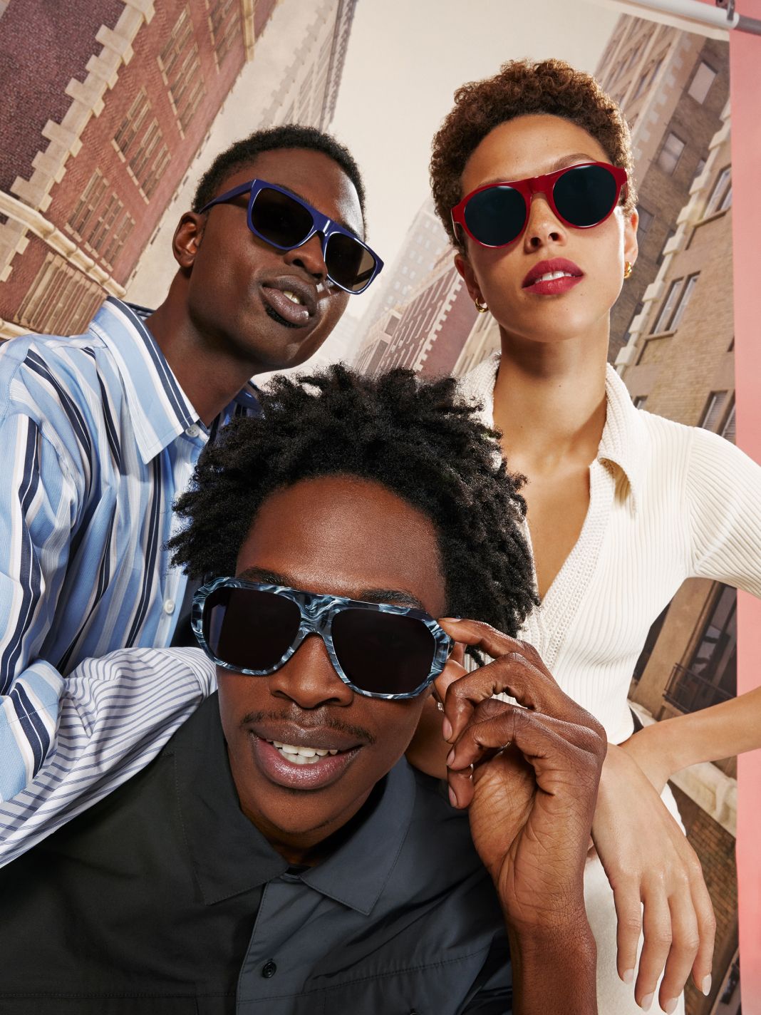 Clockwise from upper left: Model wears the Miles Morales II sunglasses in Neptune, model wears the Peter Parker II sunglasses in Brick, and model wears the Venom sunglasses in Fog.
