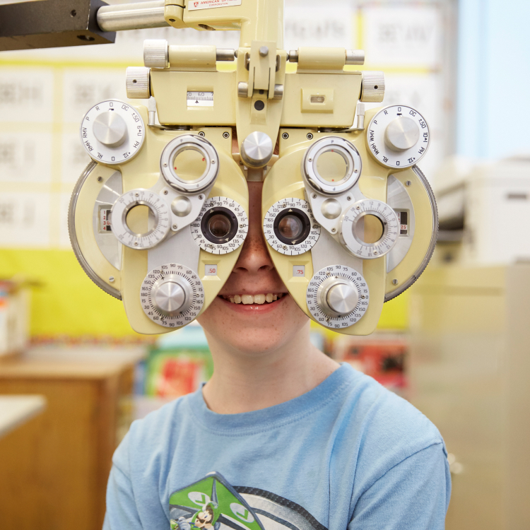 Boy getting his eyes tested