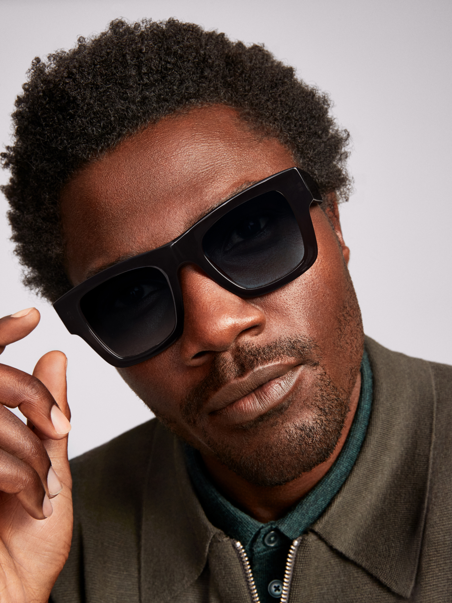 Model wears the Nalo frame in Licorice Crystal.