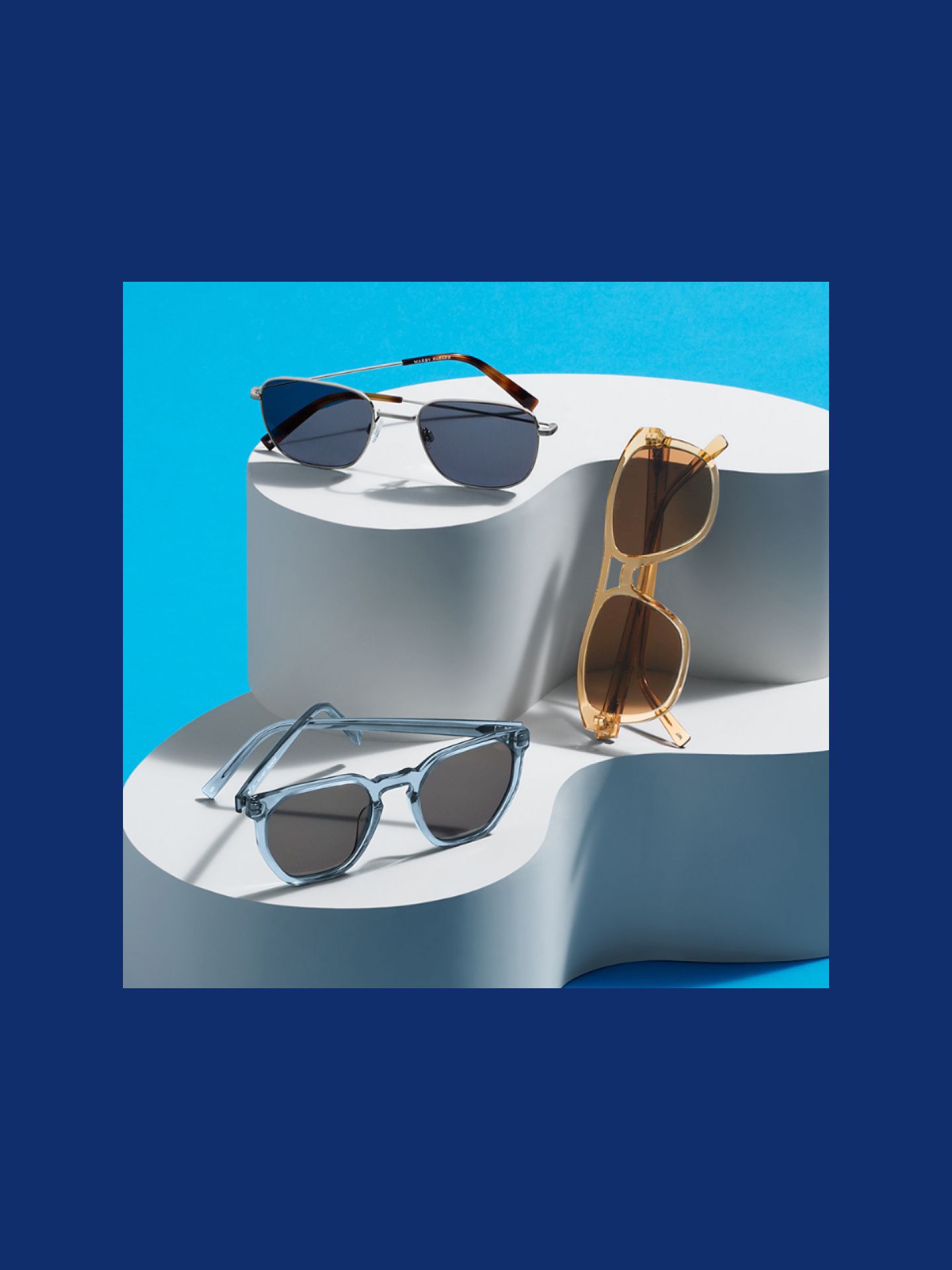 Clockwise from top: the Blount frame in Antique Silver, the Ortega frame in Nutmeg Crystal, and Tobias in Laguna Crystal.