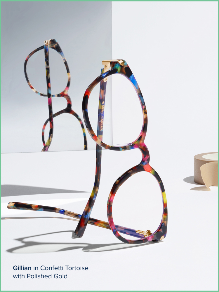 Multicolor frames against a neutral background and a mirror.