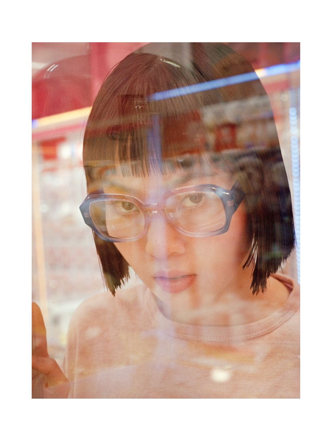 Model wears the Gilda frame in Lido Crystal Fade