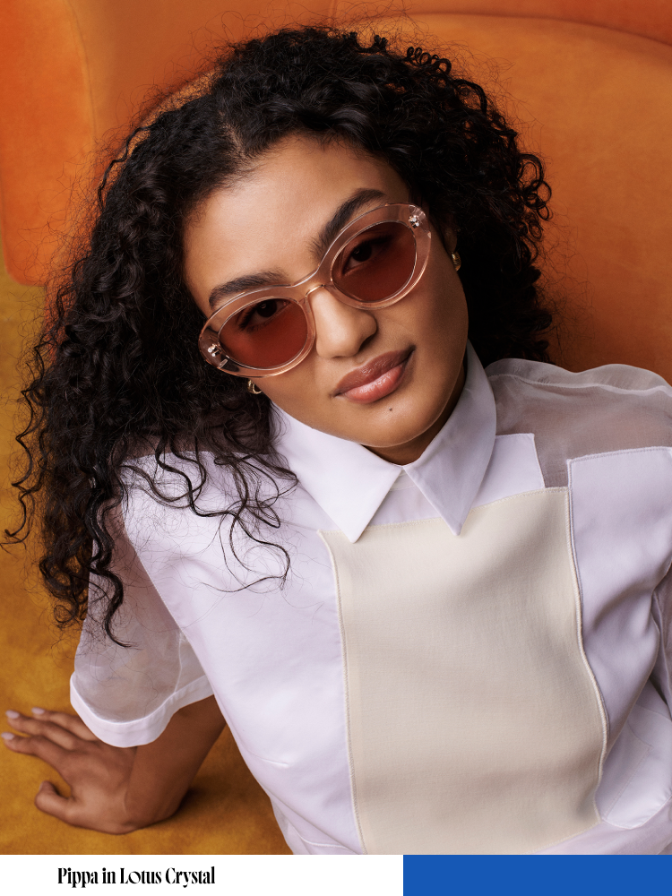Model wears the Pippa frame in Lotus Crystal.