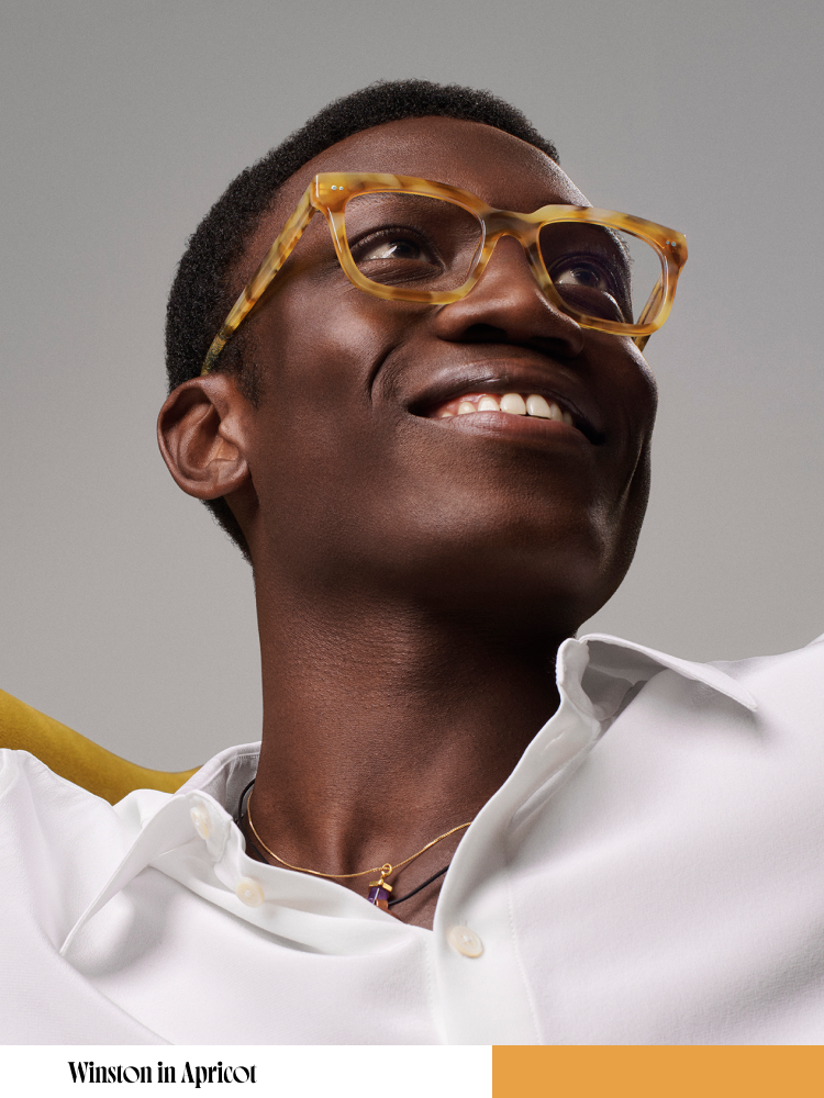 Model wears the Winston frame in Praline Tortoise.