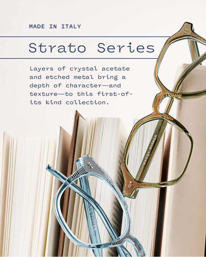 Two pairs of Strato Series glasses, one blue and one brown, resting on open books with product text.