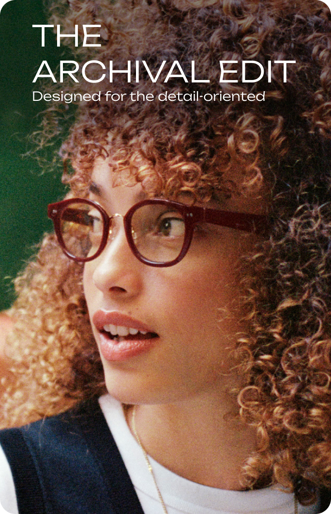 A man with glasses and a white tank top smiles in the Aero Series.