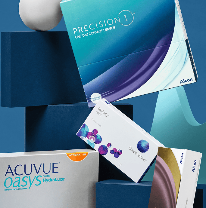 Eyewear and contact lens boxes are arranged with a pair of glasses and sunglasses.