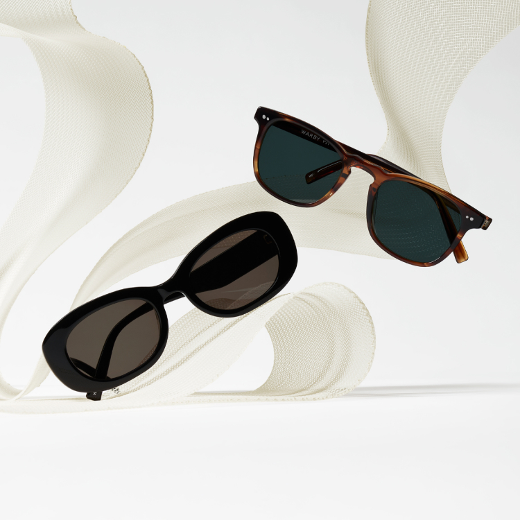 Two pairs of sunglasses, one with black oval frames and the other with tortoiseshell rectangular frames, displayed against a textured cream background.