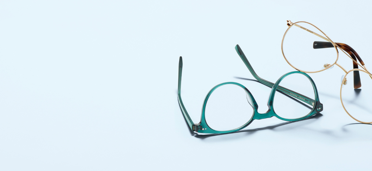 Round gold metal and green acetate eyeglass frames