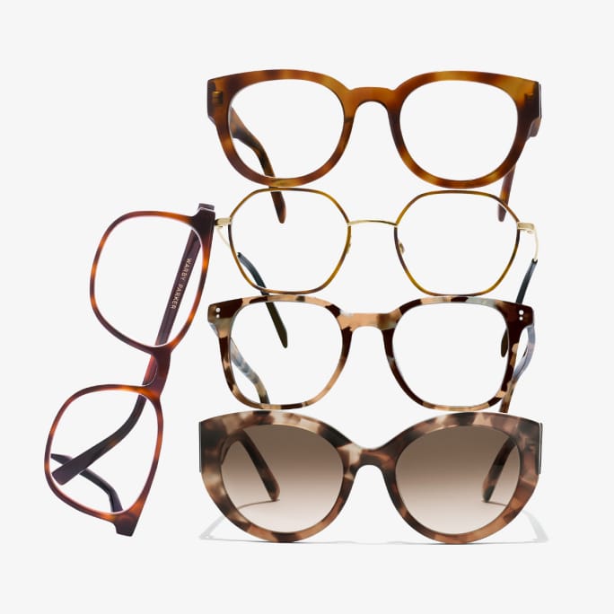 Two pairs of eyeglasses, one with clear frames and the other with tortoiseshell frames, displayed against a light blue background.