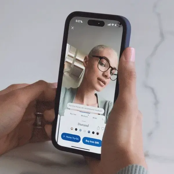 Person using VTO from warby parker on a device.