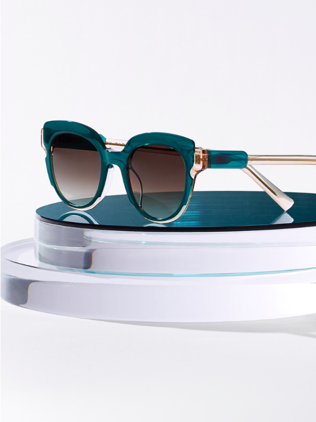 Frames resting on top of a layered crystal.