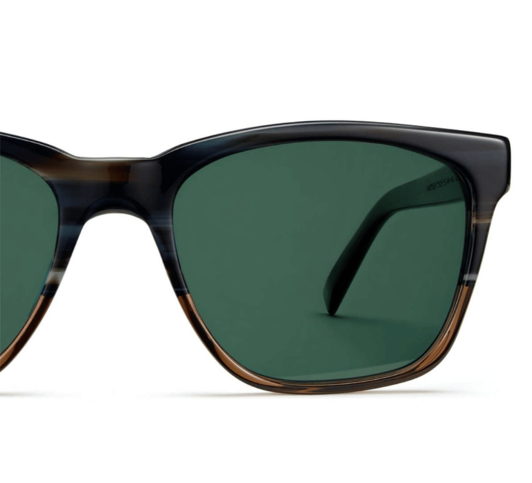 Half of a square acetate Barkley in Antique Shale Fade frame with solid green polarized lenses.