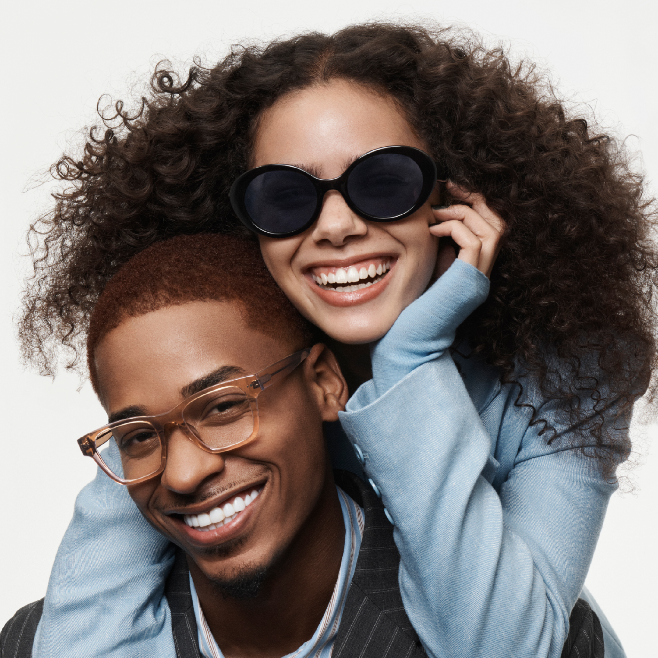 2 models posing in eyeglasses and sunglasses
