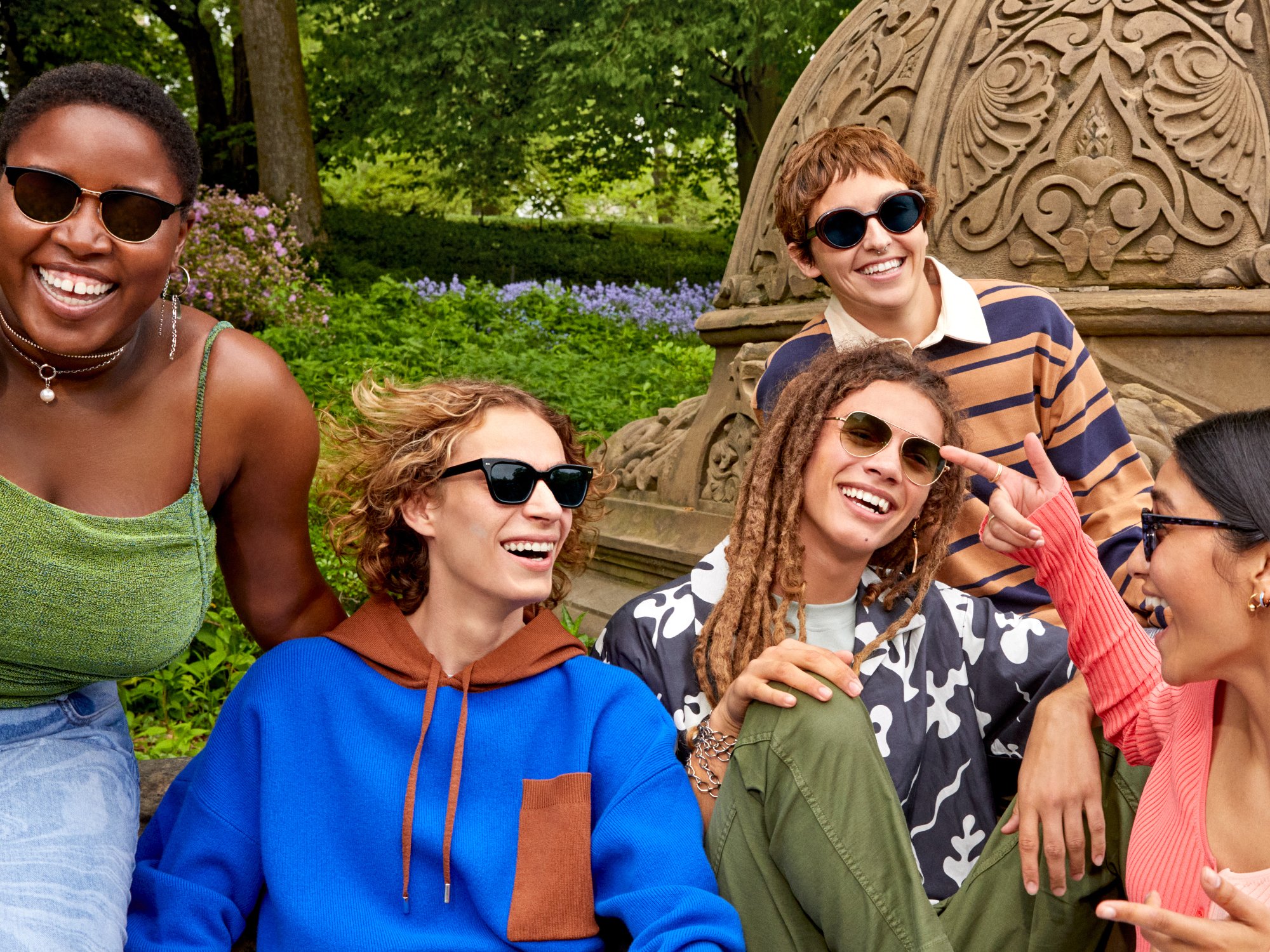 Group of models wearing sunglasses in Central Park