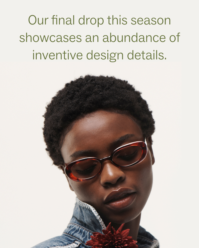 A person wearing sunglasses poses with closed eyes, wearing a denim jacket and holding a red flower. The text reads, "Our final drop this season showcases an abundance of inventive design details."