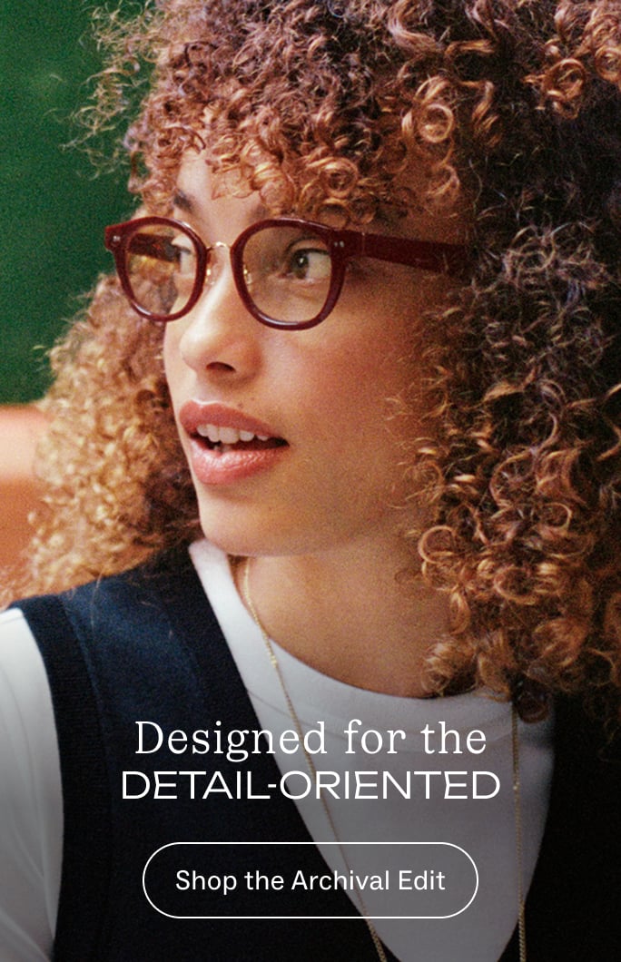 Woman with curly hair and glasses, with text "Have an eye for DETAIL? Shop the Archival Edit."