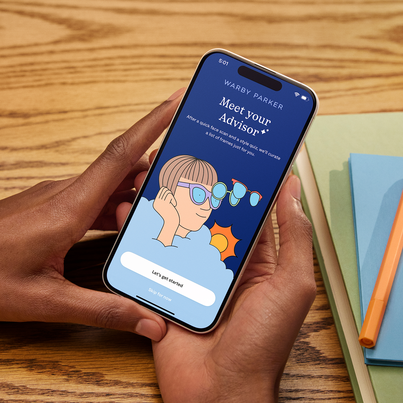 A person holds a smartphone displaying a "Meet your Advisor" app with an illustration of a person.