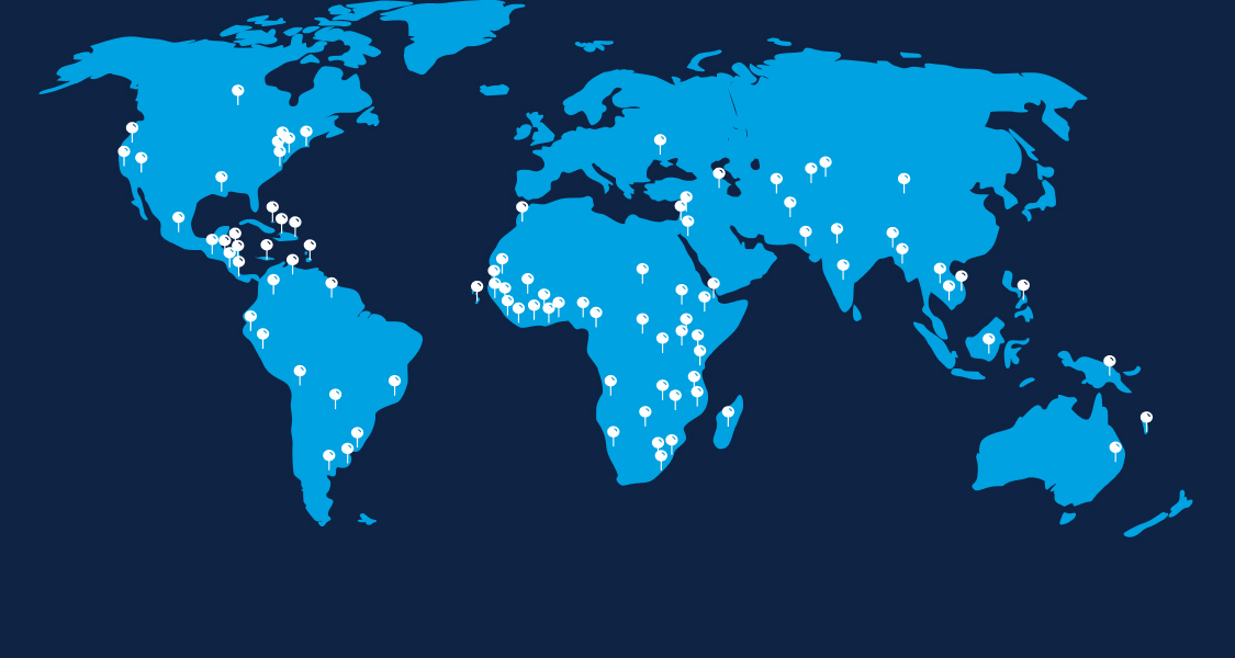 A blue world map with white location pins marking various global locations on a dark blue background.