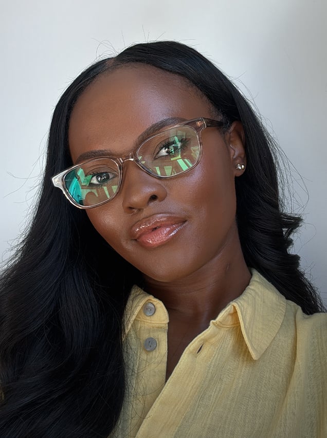 Woman wearing clear rectangle glasses
