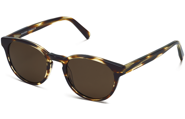 Tortoiseshell patterned sunglasses with dark lenses and a rounded square frame.