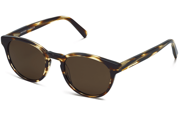 Tortoiseshell patterned sunglasses with dark lenses and a rounded square frame.