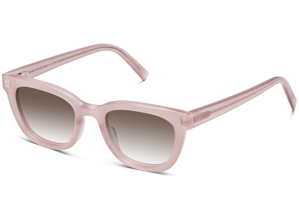 Pink cat-eye sunglasses with gradient lenses on a white background.