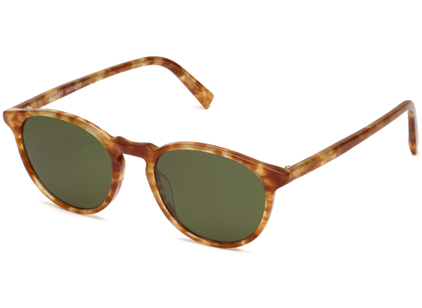 Tortoiseshell sunglasses with green lenses and an oval shape.