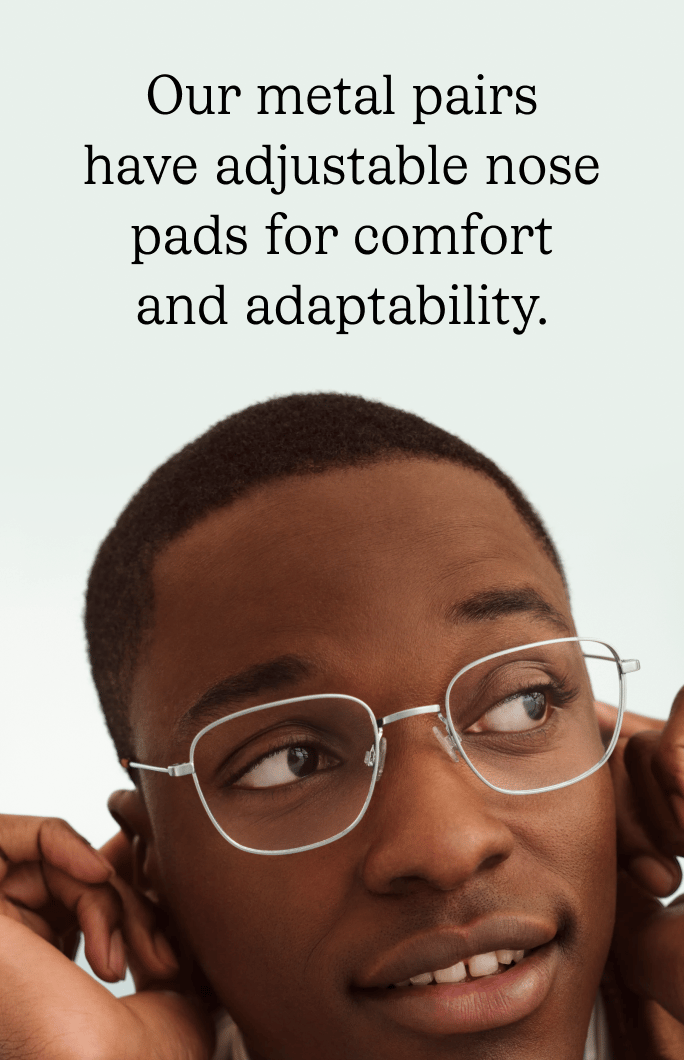A Black man wearing silver-framed glasses with clear lenses.