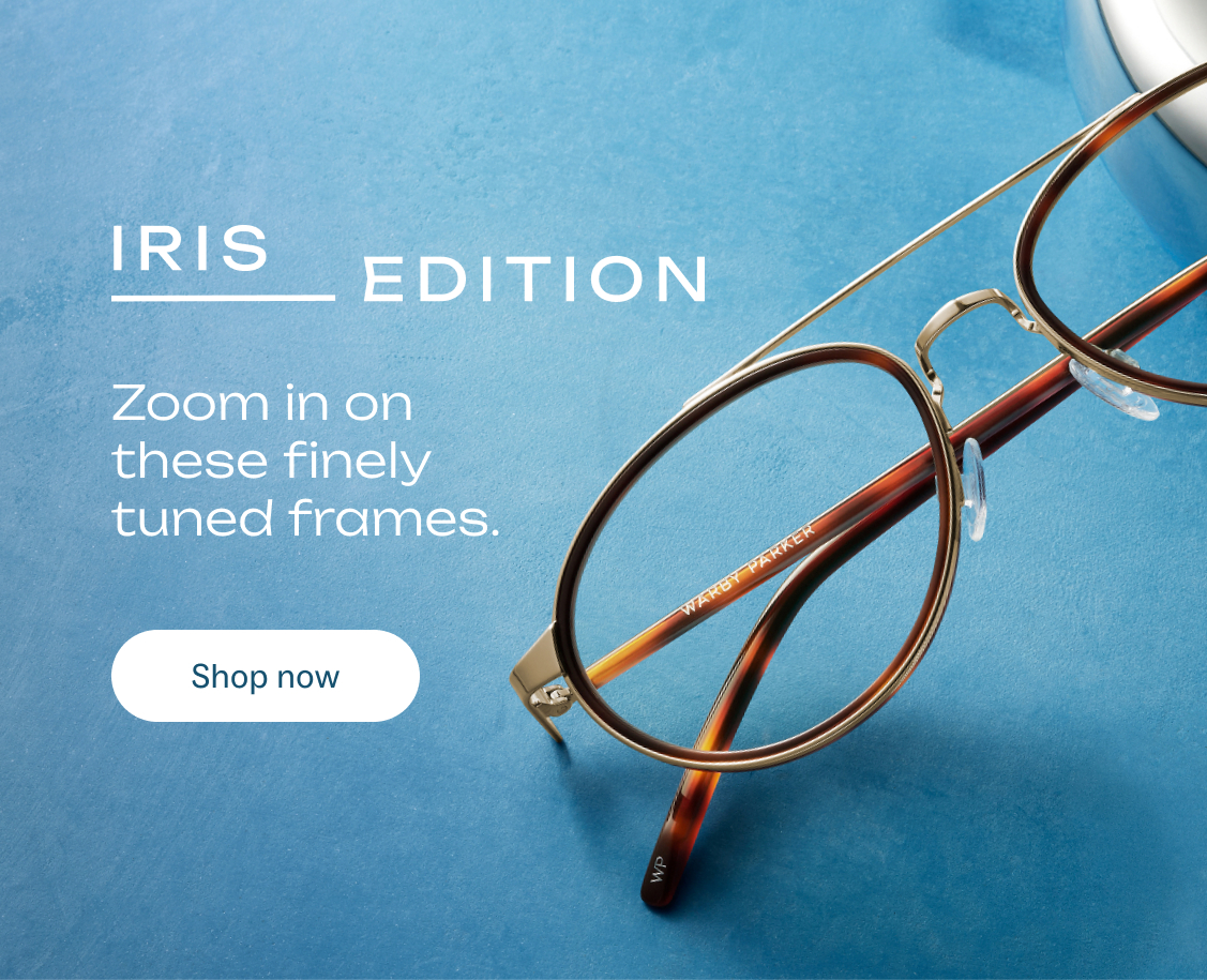 A close-up of tortoiseshell framed glasses from the Iris Edition collection, with the text "Zoom in on these finely tuned frames. Shop now."