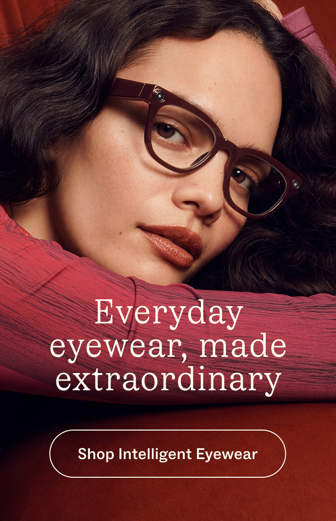 A woman wears stylish glasses with the text "Everyday eyewear, made extraordinary."