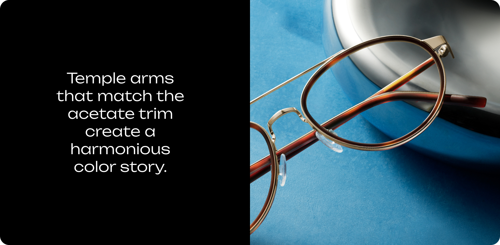 Close-up of eyeglasses with acetate trim and temple arms that match the trim.