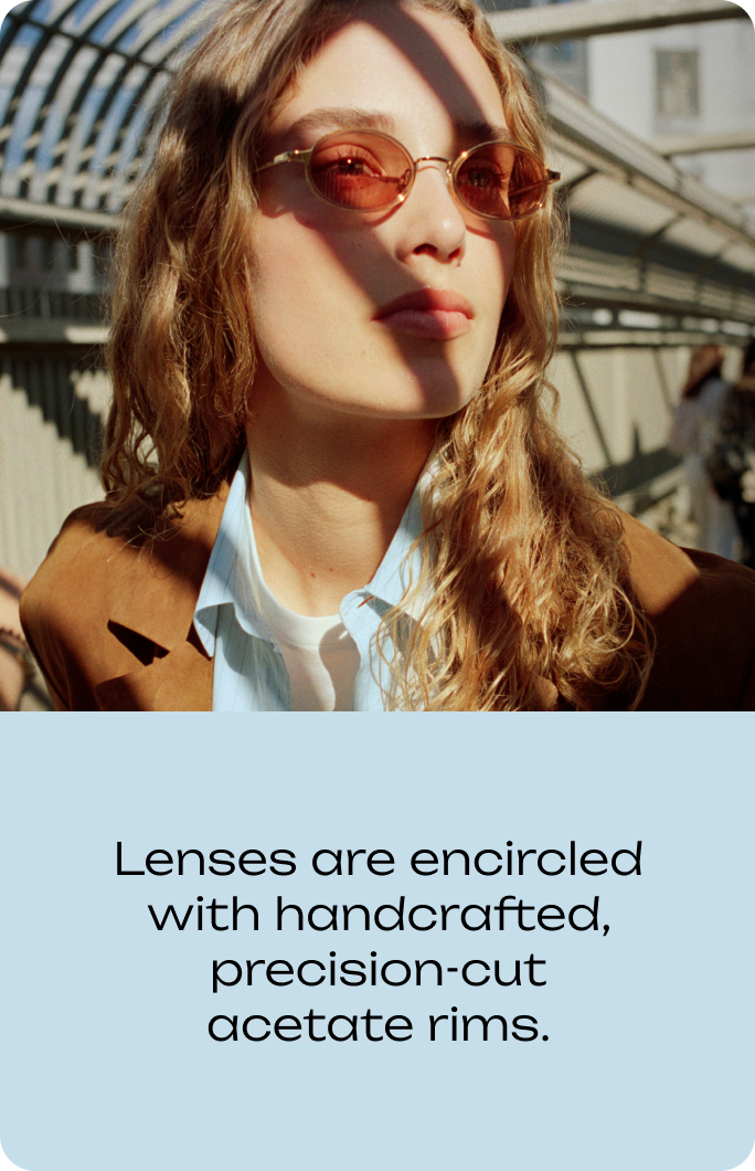 Woman wearing sunglasses with handcrafted, precision-cut acetate rims.