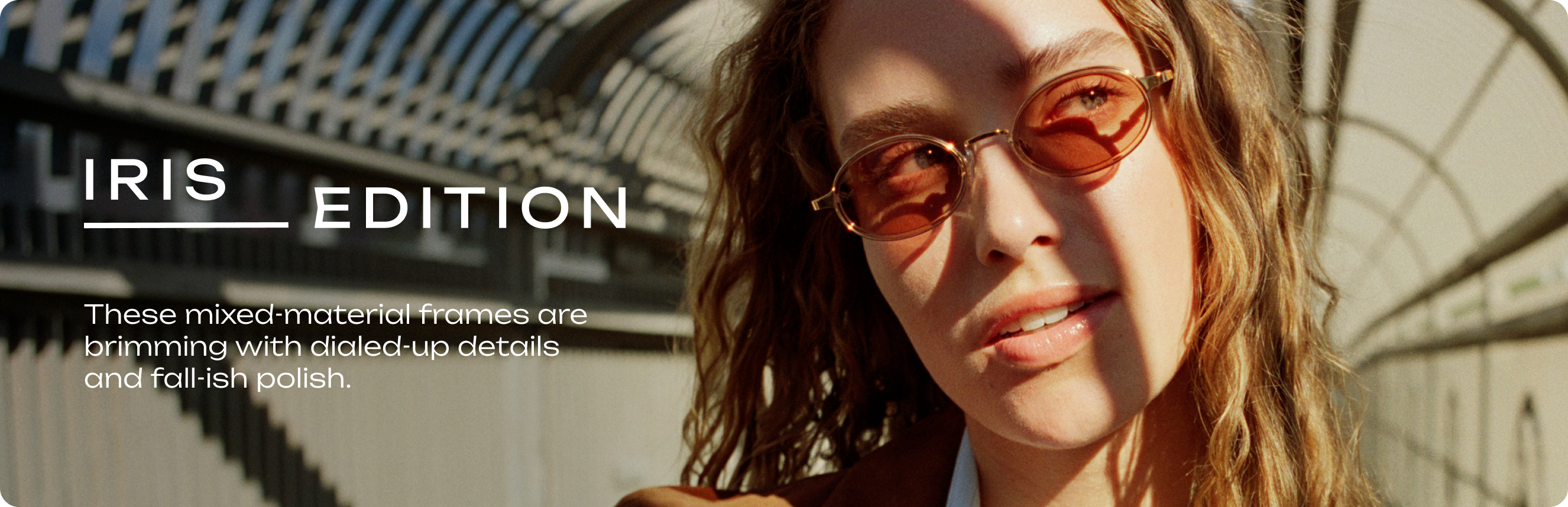 Iris Edition sunglasses with heart-shaped lenses on a woman in a tunnel.
