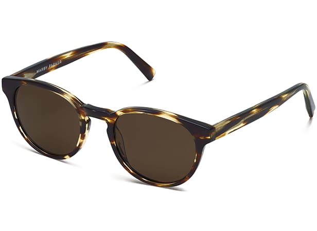 Tortoiseshell sunglasses with brown lenses and classic styling.