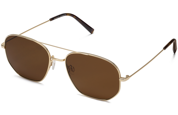 Gold-colored aviator-style sunglasses with brown lenses and black tips on the arms.