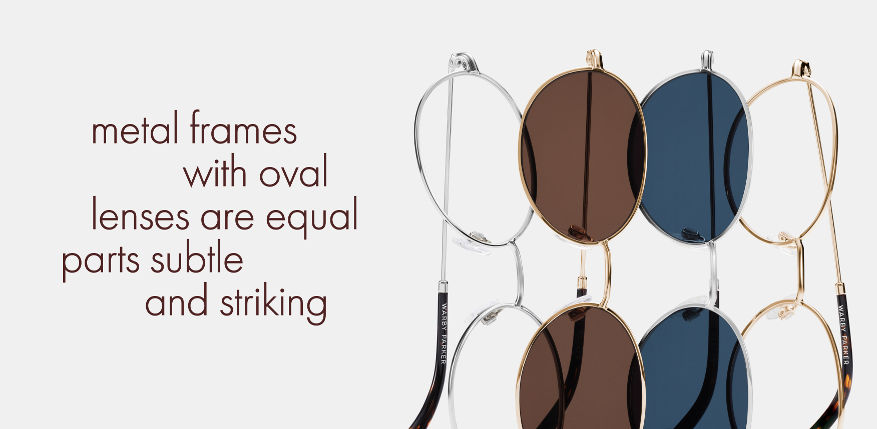 Metal framed eyeglasses with oval lenses in brown and blue.