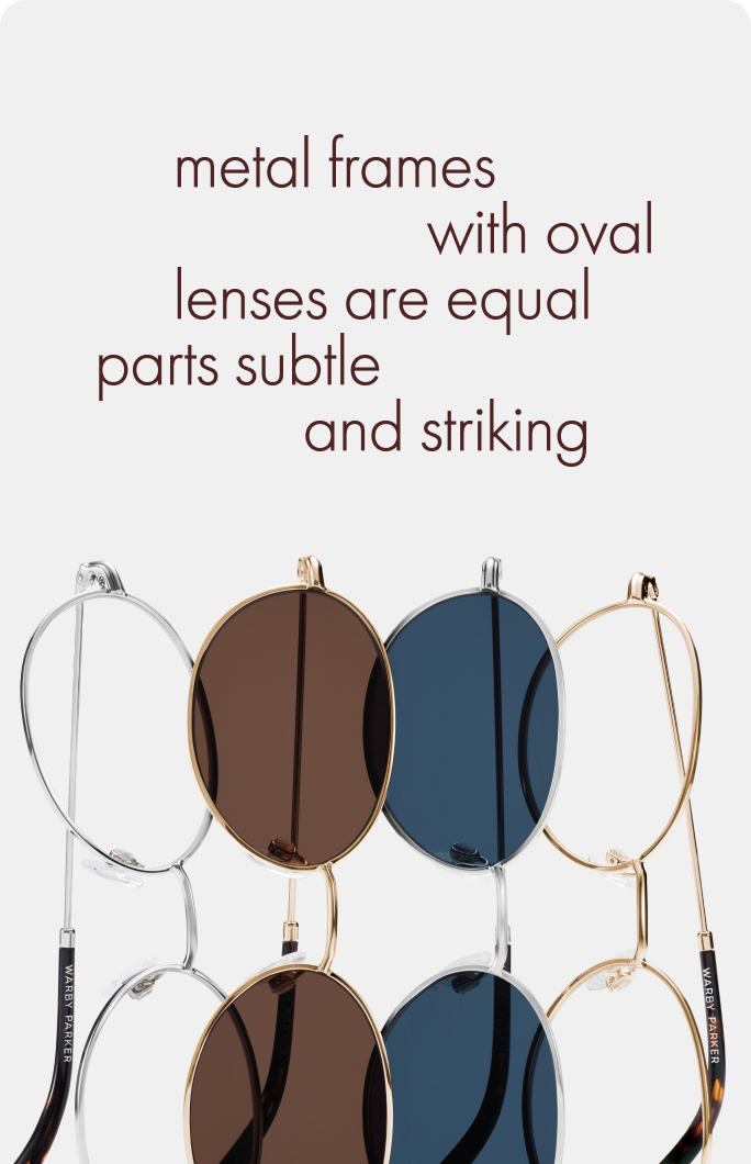 Metal framed eyeglasses with oval lenses in brown and blue.